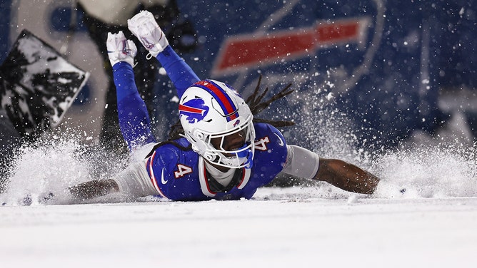 James Cook of the Buffalo Bills celebrates in the snow after scoring a touchdown during the first half of an NFL football game against the San Francisco 49ers at Highmark Stadium on December 1, 2024 in Orchard Park, New York.