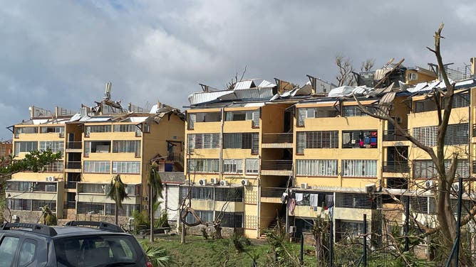 A photo taken on December 15, 2024 shows torn-off roofs of residential buildings after the cyclone Chido hit France's Indian Ocean territory of Mayotte.