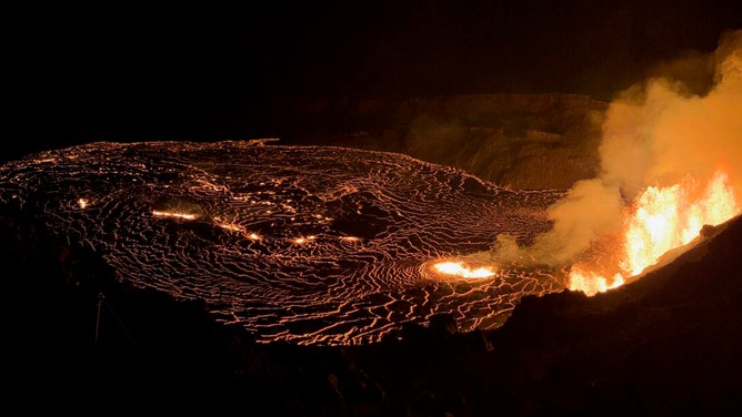 Another view of the new eruption within the summit caldera of Kīlauea, Kaluapele, that began this morning, December 23, 2024, at approximately 2:20 a.m. HST. Lava is erupting from vents on the west part of the caldera wall, feeding lava flows that cover the area of Halemaʻumaʻu crater (with an approximate diameter of 1 kilometer or 0.75 miles).