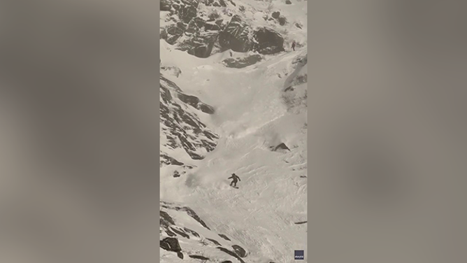 This image shows a snowboarder triggering and escaping a small avalanche on New Hampshires Mount Washington on Nov. 29, 2024.