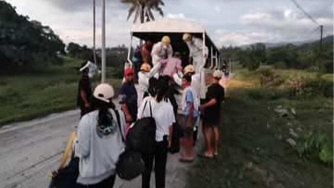 The photo provided by the Philippines Office of Civil Defense shows the evacuation of resident living near the Kanlaon Volcano after an explosive eruption on Monday, Dec. 9, 2024.