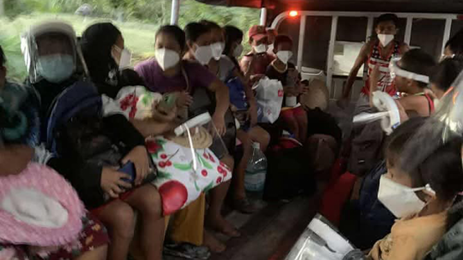 The photo provided by the Philippines Office of Civil Defense shows the evacuation of resident living near the Kanlaon Volcano after an explosive eruption on Monday, Dec. 9, 2024.