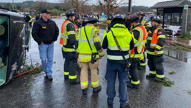 This photo shows first responders gathering after a tornado in Scotts Valley, California, on Saturday, Dec. 14, 2024.