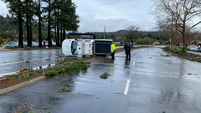 This photo shows a truck overturned on its side after a tornado in Scotts Valley, Calif., on Saturday, Dec. 15, 2024.