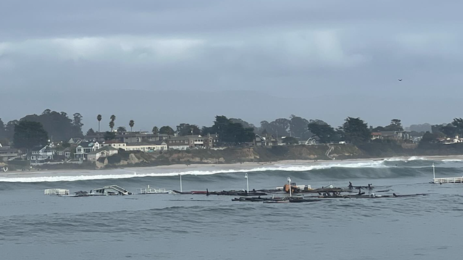 Part of the Santa Cruz Wharf floating in the Pacific Ocean on Monday, Dec. 23, 2024. 