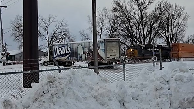 A milk truck driver narrowly escaped a catastrophic train collision in Pennsylvania amid an epic lake-effect snowstorm.