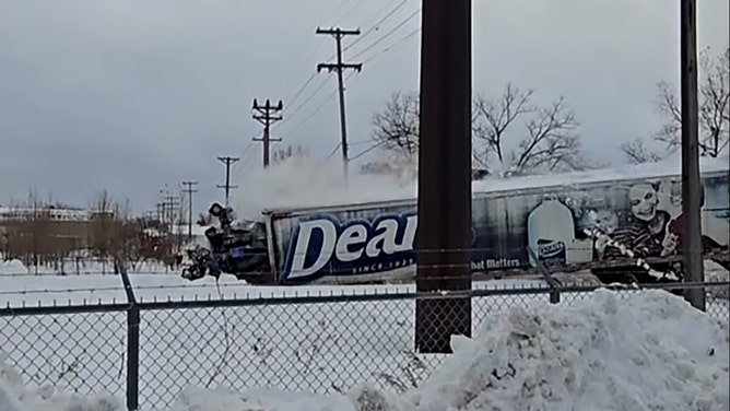 A milk truck driver narrowly escaped a catastrophic train collision in Pennsylvania amid an epic lake-effect snowstorm.