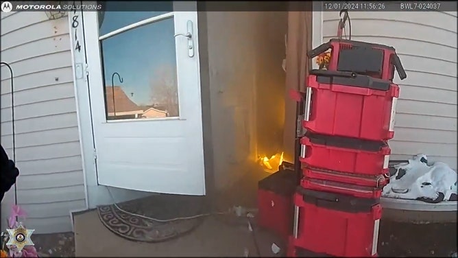 Arapahoe County Sheriff’s Office deputies Ryan McConnell and Chris Calderon displayed extraordinary bravery when they rescued two young siblings trapped in their snowy backyard on Sunday as their home burned. Dramatic body camera footage captures the harrowing scene.