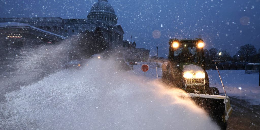 Dangerous winter storm knocks out power to 300,000 from vicious winds as storm may 'bomb out' over Great Lakes