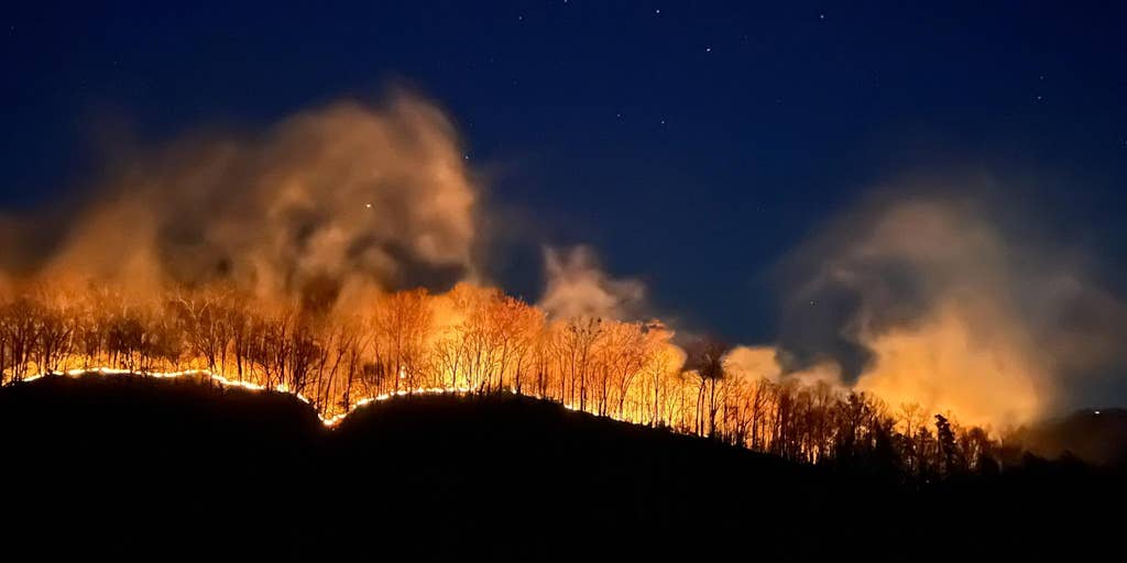 Downed power line during high winds erupts wildfires in Helene-ravaged area of North Carolina