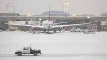 Travel at nation's busiest airport snarled as winter storm impacts 100 million across southern US