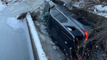 First responder falls through ice during rescue of infant, mother from rollover crash