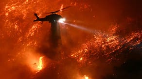 Harrowing video captures aerial Los Angeles firefighter's view above fiery abyss as renewed windstorm returns