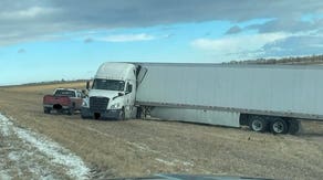 Tractor-trailers blown off South Dakota highway by powerful winds