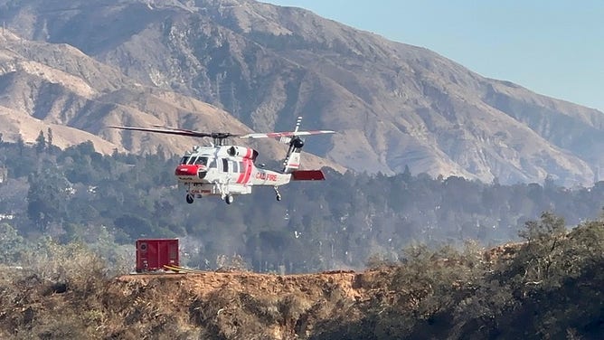 Firefighting staging behind NASA's Jet Propulsion Laboratory in California during the January 2025 Los Angeles fires.