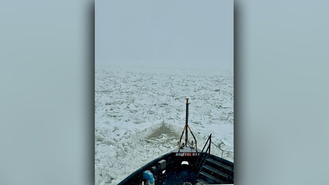 U.S. Coast Guard Cutter Bristol Bay (WTGB 102) approaches thick brash ice in Buffalo Harbor, New York Jan. 24, 2025. This Ice Breaking technique involves backing the ship through previously broken ice and then building significant momentum to help knock down windrows and pressure ridges.