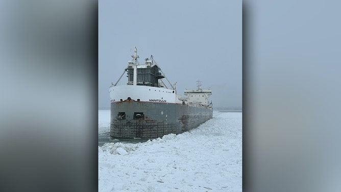 U.S. Coast Guard Cutter Bristol Bay (WTGB 102) approaches the motor vessel MANITOULIN beset by ice in Buffalo, New York on Lake Erie Jan. 23, 2025.