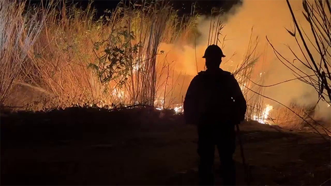 This photo shows a firefighter at the scene of the Auto Fire in Ventura, California, on Monday, Jan. 13, 2025.