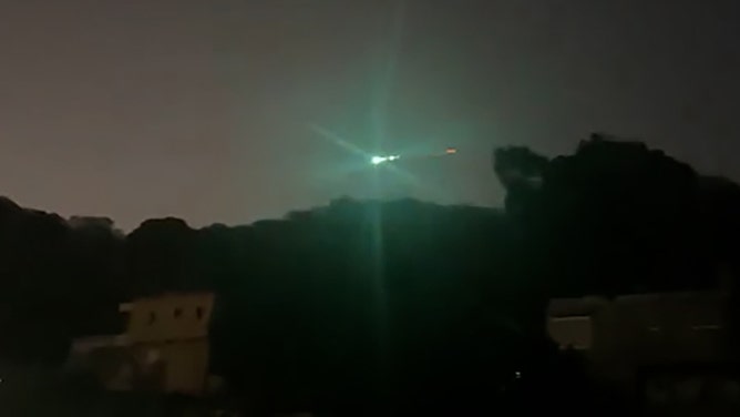 Footage captured by X user @PhillyMadeRai shows the meteor glowing an intense green as it streaked across the sky on Saturday night.