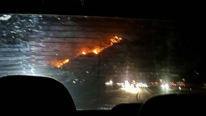 The Eaton Fire seen from Jessie Christiansen's car as her family evacuated in January 2025.