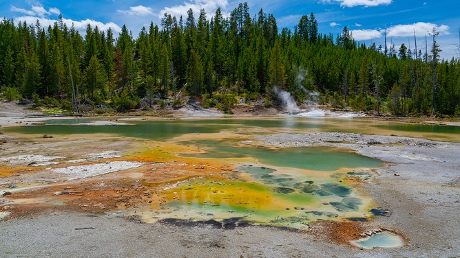 General views of Crackling Lake in the Norris Geyser Basin at Yellowstone National Park on May 27, 2021 in Yellowstone National Park, Wyoming.