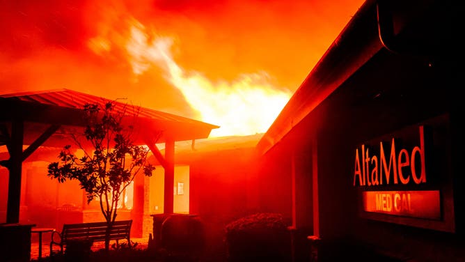 A medical building burns during the Eaton fire in Pasadena, California on January 8, 2025.