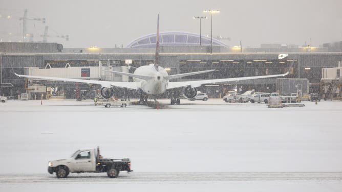 Snow blankets the Hartsfield-Jackson Atlanta International Airport as a winter storm moves into the area on January 10, 2025 in Atlanta, Georgia.