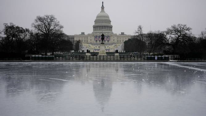 The U.S. Capitol and frozen U.S. Capitol Pool are seen on January 19, 2025 in Washington, DC. U.S. President-elect Donald Trump and Vice President-elect JD Vance (R-OH) will be sworn in on January 20 in an indoor ceremony due to inclement weather.