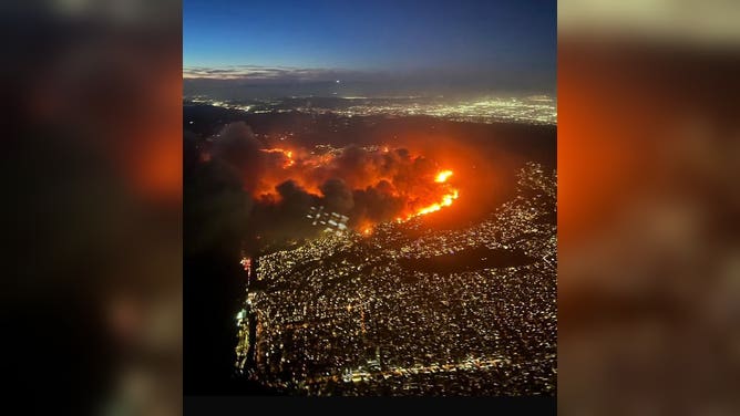 Photo from plane shows wildfires scorching southern California. 