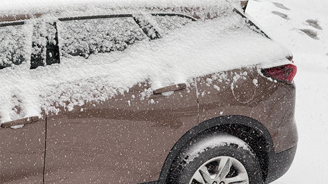 This image shows snow on a car in Houston on Tuesday, Jan. 21, 2025.