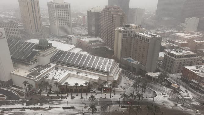 Snow blankets Canal Street and the Central Business District in New Orleans on Jan. 21, 2025 during a major winter storm.
