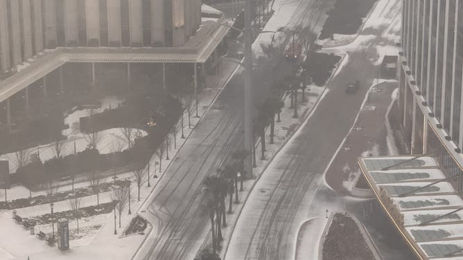 Snow blankets Canal Street and the Central Business District in New Orleans on Jan. 21, 2025 during a major winter storm.