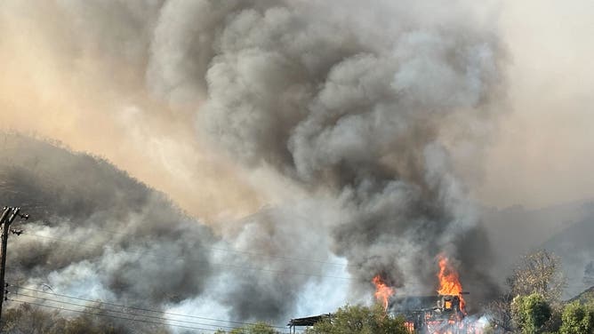 Palisades Fire in Mandeville Canyon, California.