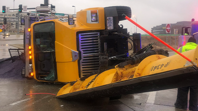 This image shows a snow plow that overturned in icy conditions in Platte County, Missouri, on Saturday, Jan 4, 2025.