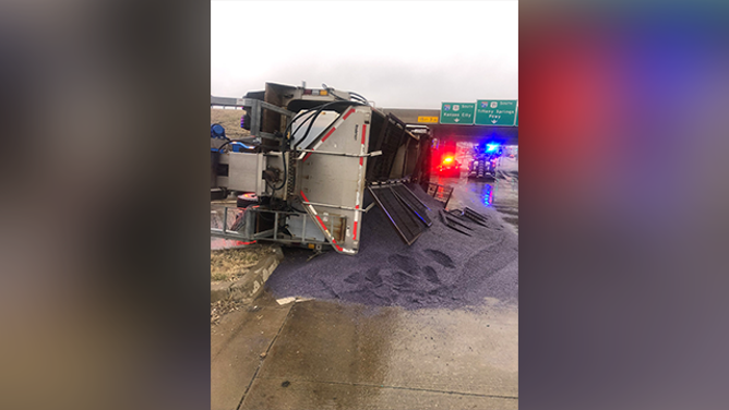 This image shows a truck that overturned in icy conditions in Platte County, Missouri, on Saturday, Jan 4, 2025.