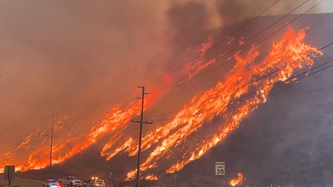 Flames from the Hughes Fire near Casaic Lake in Los Angeles County, California on Jan. 22, 2025.