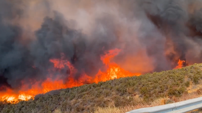 Flames from the Hughes Fire near Casaic Lake in Los Angeles County, California on Jan. 22, 2025.