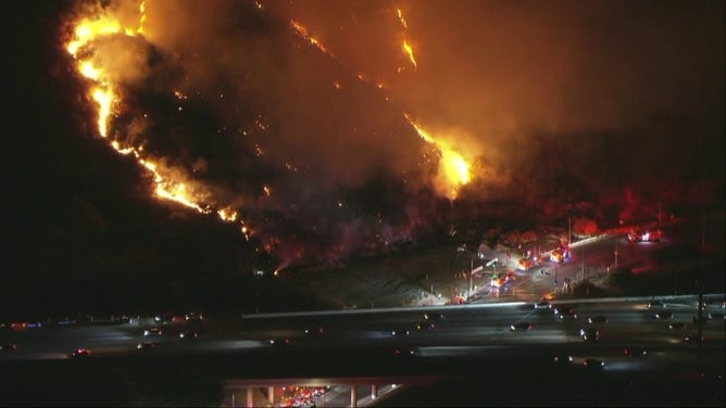 This image shows the Sepulveda Fire burning near the 405 Freeway in Los Angeles County.