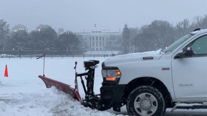 This image shows a snow plow in front of the White House in Washington, D.C., as a deadly winter storm slams the mid-Atlantic on Monday, Jan. 6, 2025.