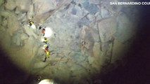 Watch: Drone video shows rescue of teen trapped between California boulders