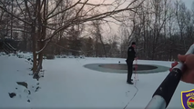 Watch: Police officers rescue dog from icy pond in Ohio