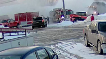 New York firehouse collapses under heavy snow with firefighters on roof narrowly avoiding injury