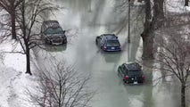 Watch: Drone shows massive water main break wreaking havoc in frozen Chicago suburb