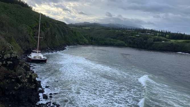 Catamaran runs aground in Maui