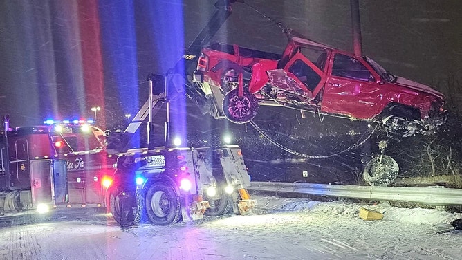 A Kansas City, Kansas, driver survived a rollover crash on a slick I-70 early Tuesday morning thanks to his seatbelt, according to the Kansas Highway Patrol. The driver lost control of his truck, struck a guardrail and rolled multiple times, but walked away from the wreckage unharmed.