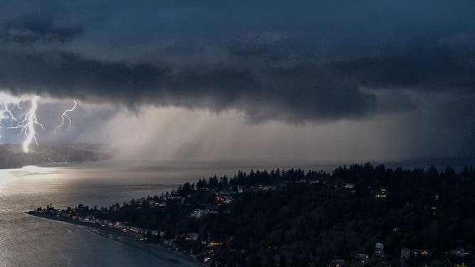 A lightning strike and storm clouds over the Puget Sound in Washington on Feb. 5, 2025.