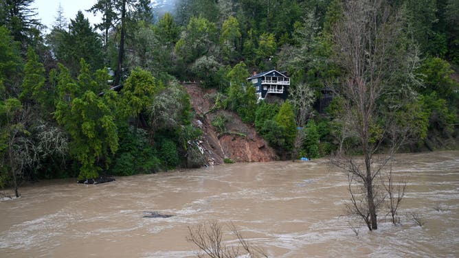 California, USA - February 4: A large slide takes out an entire house that dumped into the Russian river under heavy rain in the Foresville in Sonoma County, California, USA, February 4, 2025 as an atmospheric river hits northern California. 