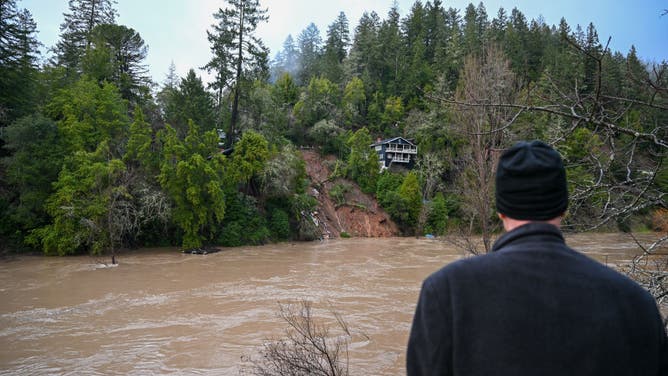 California, USA - February 4: A large slide takes out an entire house that dumped into the Russian river under heavy rain in the Foresville in Sonoma County, California, USA, February 4, 2025 as an atmospheric river hits northern California.