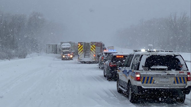 A multi-vehicle pileup during a snow squall caused hazardous driving conditions, closed a Canadian highway, and prompted a significant emergency response.