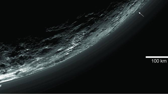 This image of haze layers above Pluto limb was taken by NASA New Horizons spacecraft. About 20 haze layers are seen.